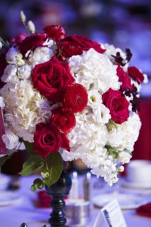 Red and white florals make this circus themed event complete.
