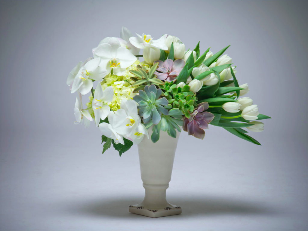 Vased arrangement with succulents